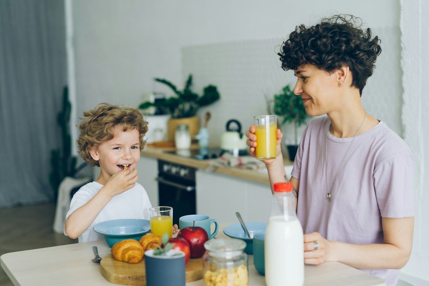 A family talking at a kitchen table